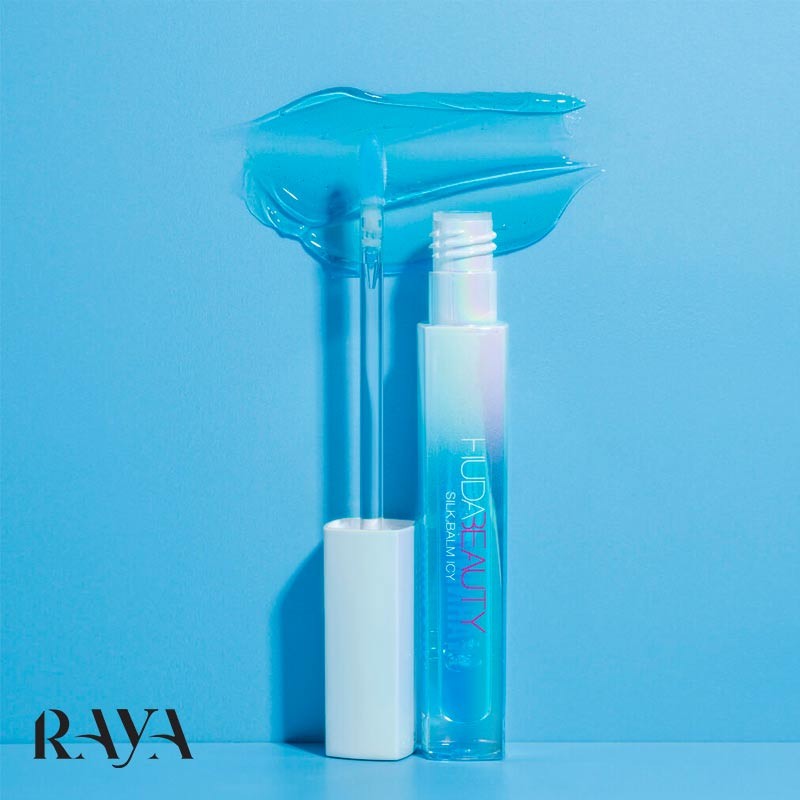بالم لب یخی حجم دهنده و خنک و براق کننده هدی بیوتی مدل سیلک بالم آیسی کریو پلامپینگ Huda Beauty Silk Balm Icy Cryo-Plumping Lip Balm